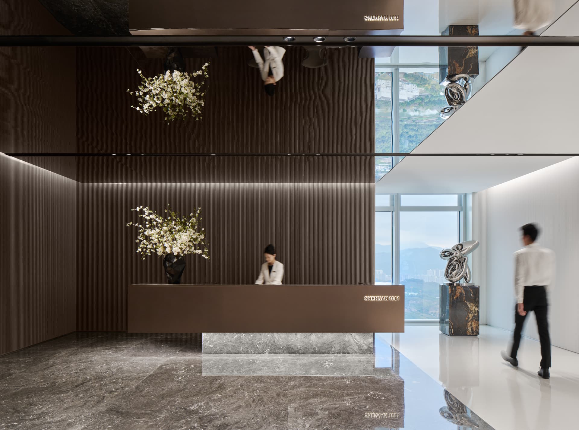No.1 Shennan Road — Shenzhen, China: No.1 Shennan Road, Shenzhen — reception lobby with illuminated ribbed wall and mirrored ceiling