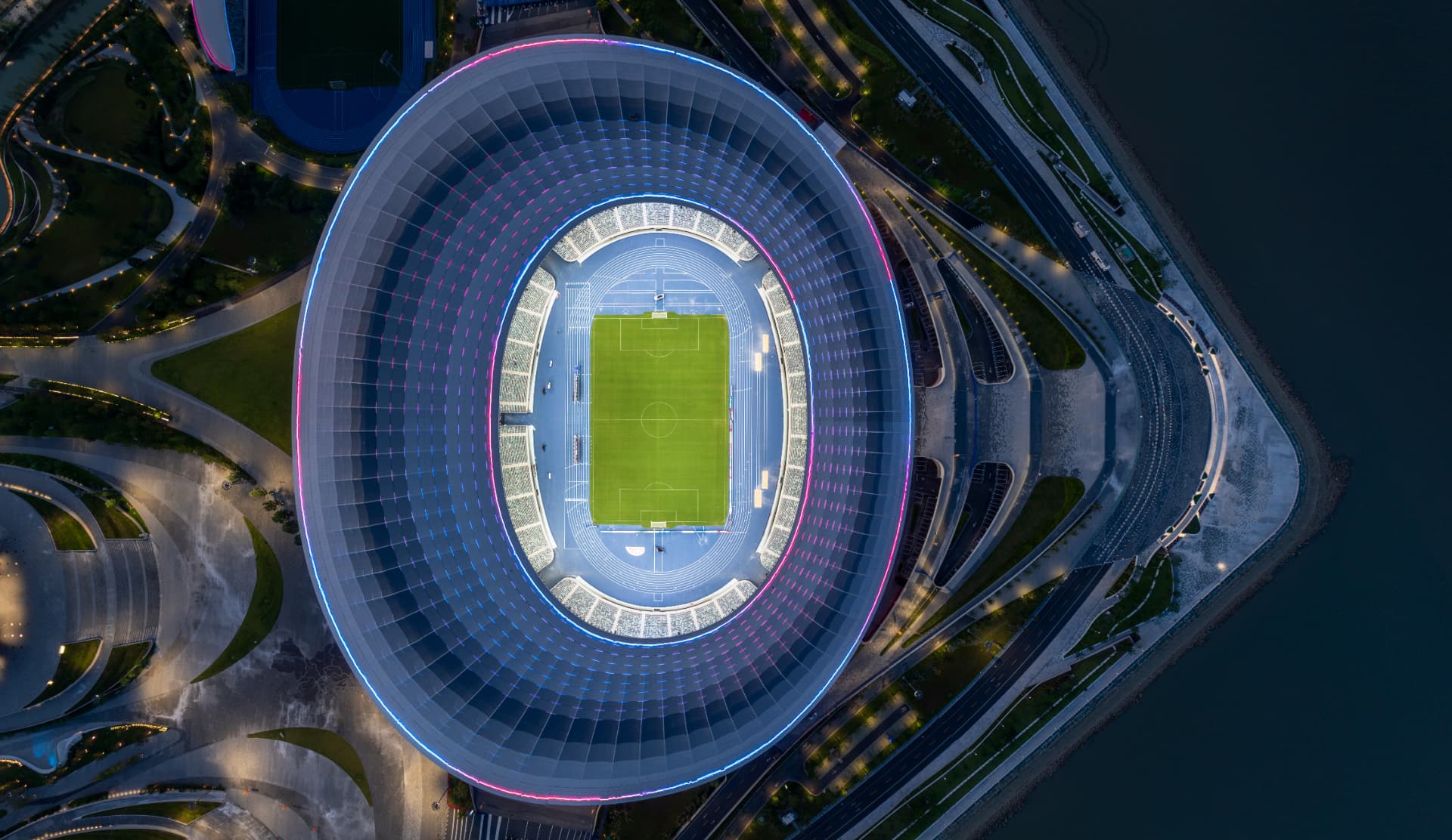 Estadio Nan Sha — Guangzhou, China: Nan Sha Stadium, Guangzhou — top-down view of the fan-shaped roof and pitch