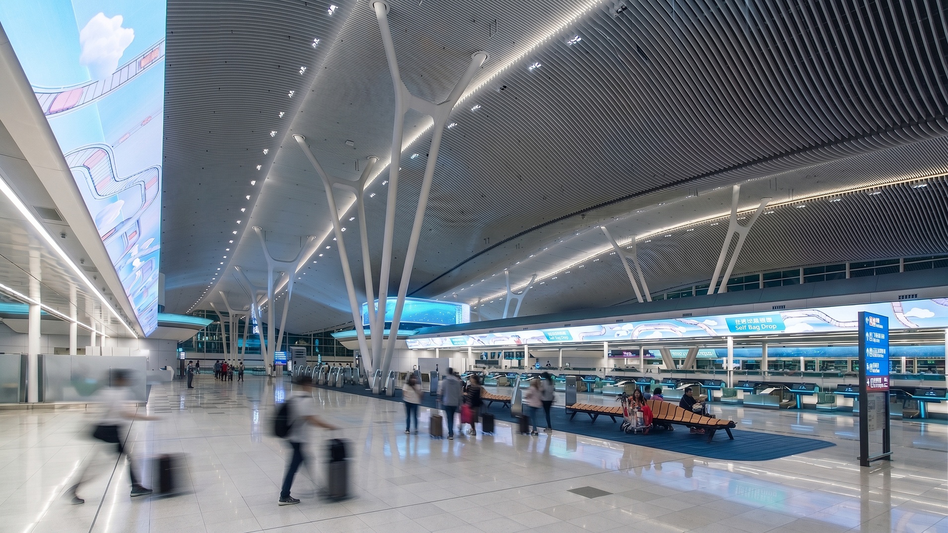 Hong Kong International Airport – Terminal 2 — Hong Kong, China: Hong Kong International Airport Terminal 2 — check-in hall with self bag drop counters, Lichtvision lighting design