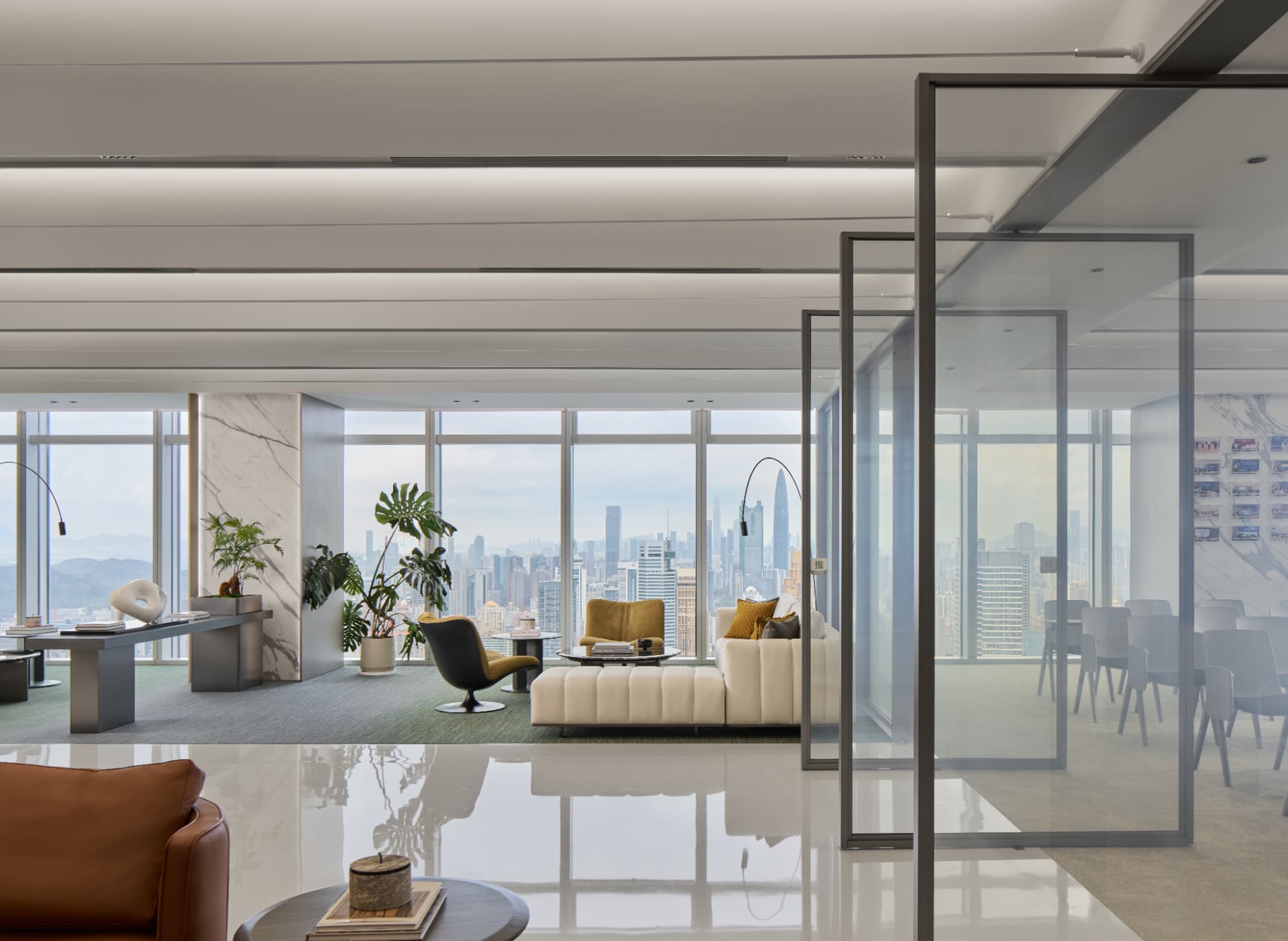 No.1 Shennan Road — Shenzhen, China: No.1 Shennan Road, Shenzhen — office lounge with cove lighting and city view