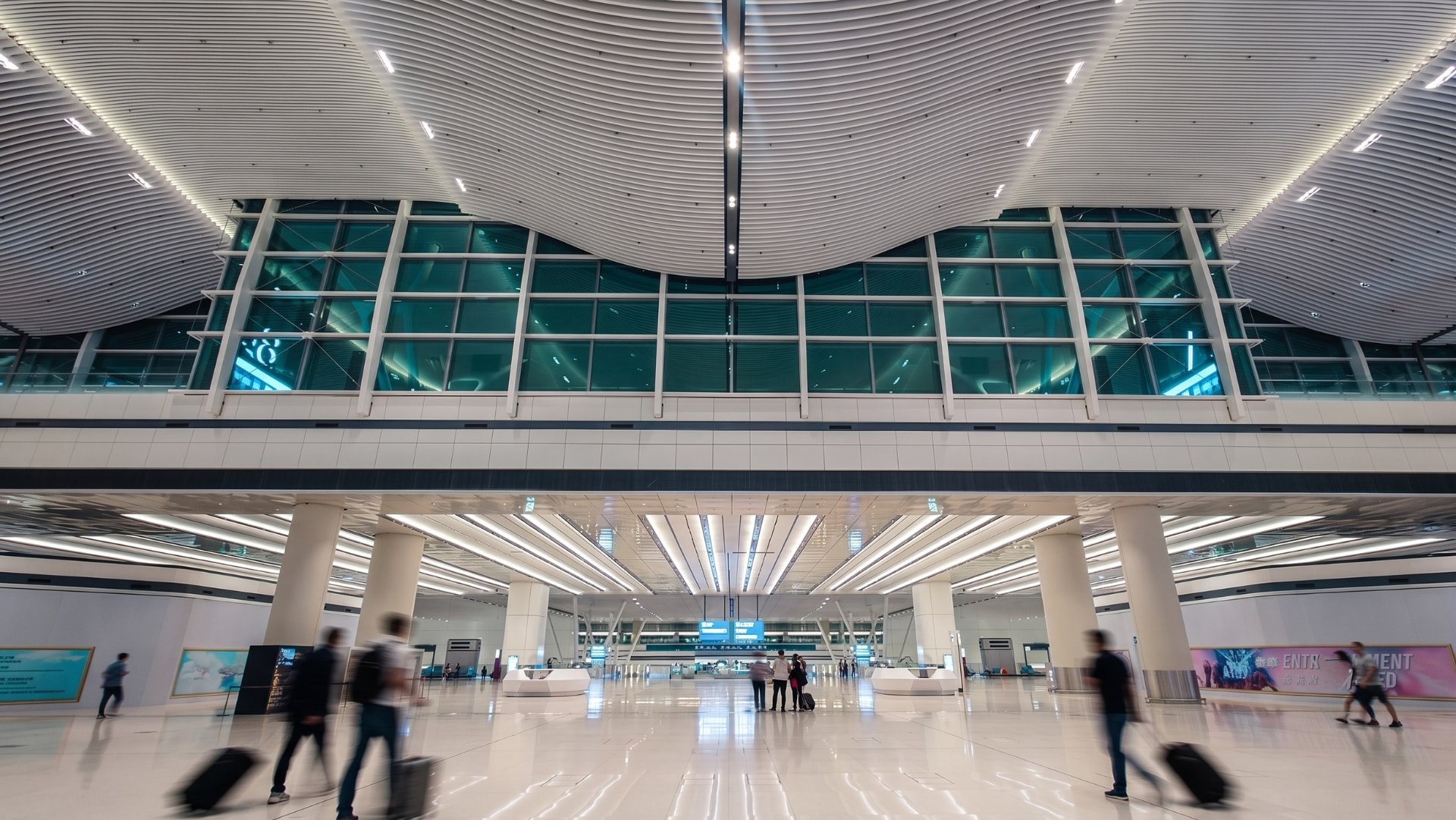 Hong Kong International Airport – Terminal 2 — Hong Kong, China: Hong Kong International Airport Terminal 2 — main concourse under the wave ceiling, Lichtvision lighting design